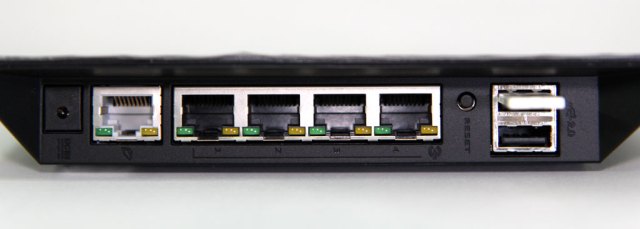photo of ASUS router ports, with a USB stick connected