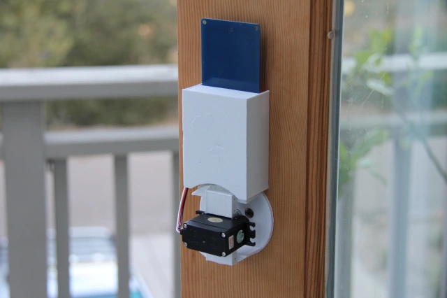 photo of a DIY NFC door lock found on Instructables.com, with all the electronics & parts on the interior side of the door